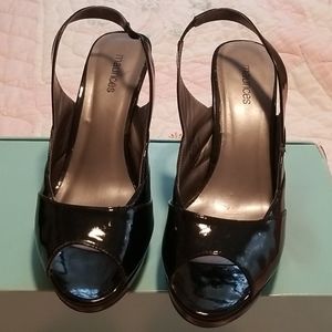 High heeled black sling back shoes.   Sz 10